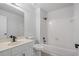 Cozy bathroom with single vanity, toilet, and shower-tub combination at 1368 Christiana Dr, Lawrenceville, GA 30043