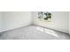 Bedroom with carpet floors and a view of the neighborhood at 1471 Stephens View Dr, Loganville, GA 30052