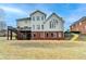 Backyard with a deck and a view of the home's exterior at 340 Kincardine Way, Alpharetta, GA 30022