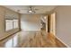 A spacious bedroom offering natural light and hardwood flooring at 340 Kincardine Way, Alpharetta, GA 30022