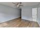Light-filled bedroom with hardwood floors and ensuite bathroom, perfect for relaxation at 340 Kincardine Way, Alpharetta, GA 30022