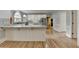 Large kitchen featuring granite countertops, stainless steel appliances, and hardwood flooring at 340 Kincardine Way, Alpharetta, GA 30022