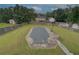 This backyard features a covered pool, a basketball hoop, and several storage sheds at 102 Peaceful Vw, Acworth, GA 30102