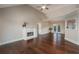 Spacious living room with hardwood floors, fireplace, and French doors at 102 Peaceful Vw, Acworth, GA 30102
