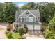Beautiful home with a manicured lawn and welcoming front porch in a tree-lined neighborhood at 111 Jeffrey Pl, Smyrna, GA 30082