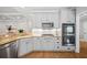 Bright kitchen features stainless steel appliances, and light granite countertops at 111 Jeffrey Pl, Smyrna, GA 30082