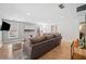 Bright living room featuring a comfortable sofa, modern decor, and ample natural light at 111 Jeffrey Pl, Smyrna, GA 30082