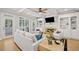 Bright living room with custom built-ins and marble fireplace, seamlessly blends comfort and sophistication at 111 Jeffrey Pl, Smyrna, GA 30082