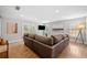 Inviting living room showcasing a cozy sectional sofa, modern decor, and outdoor access at 111 Jeffrey Pl, Smyrna, GA 30082