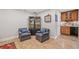 Inviting sitting room featuring built-in cabinets, plush armchairs, and stylish decor at 111 Jeffrey Pl, Smyrna, GA 30082