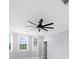 Bedroom featuring natural light from windows, ceiling fan, and hardwood floors at 2400 Worth Ave, Loganville, GA 30052