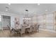 Dining room with an elegant table, chairs, and custom geometric wall decor at 2400 Worth Ave, Loganville, GA 30052