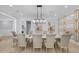 Spacious dining room with a large table and designer lighting at 2400 Worth Ave, Loganville, GA 30052