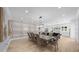 Formal dining room with an elegant table and unique wall decor at 2400 Worth Ave, Loganville, GA 30052