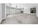 Large garage space with a concrete floor and two garage doors, providing lots of parking area at 2400 Worth Ave, Loganville, GA 30052