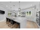 Beautiful open kitchen with an oversized island, bar seating and modern appliances at 2400 Worth Ave, Loganville, GA 30052