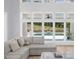 Living room featuring lots of windows and a view of the swimming pool at 2400 Worth Ave, Loganville, GA 30052