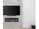 Living room with marble fireplace and shiplap wall at 2400 Worth Ave, Loganville, GA 30052