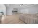 Bright main bedroom featuring a fireplace, tray ceilings and access to the outdoors at 2400 Worth Ave, Loganville, GA 30052