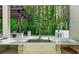 Outdoor kitchen featuring a sink, bar, grill, and an adjacent outdoor dining area with a pergola at 2400 Worth Ave, Loganville, GA 30052