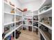 Walk-in pantry with floor to ceiling shelving, ideal for maximum storage and organization at 2400 Worth Ave, Loganville, GA 30052