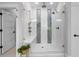 Contemporary shower with glass enclosure and multi-shower head system at 2400 Worth Ave, Loganville, GA 30052