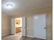 Inviting living room featuring an open doorway to the kitchen, highlighting the home's layout at 2986 Parc Lorraine, Lithonia, GA 30038