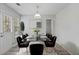 Bright dining room featuring modern furnishings and a glass-top dining table at 331 Overlook Turn Nw, Conyers, GA 30012