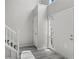 Bright entryway featuring hard wood floors and a secure front door at 331 Overlook Turn Nw, Conyers, GA 30012