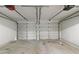 Spacious two car garage with automatic door openers and cement flooring at 331 Overlook Turn Nw, Conyers, GA 30012