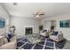 Comfortable living room featuring a plush sofa, armchairs, fireplace, and stylish decor at 331 Overlook Turn Nw, Conyers, GA 30012