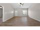 Inviting living room filled with natural light and featuring sleek, modern vinyl plank flooring throughout at 389 Campground School Rd, Dallas, GA 30157