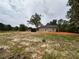 Home exterior shot from the yard, showing the house's setting and surrounding landscape at 389 Campground School Rd, Dallas, GA 30157
