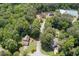 Aerial view of neighborhood homes, pool, and tennis courts at 2101 Breconridge Sw Dr, Marietta, GA 30064