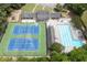 Aerial view of community amenities including pool, clubhouse, playground, and tennis courts at 2101 Breconridge Sw Dr, Marietta, GA 30064