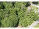 A canopy of lush trees surrounds the house at 2101 Breconridge Sw Dr, Marietta, GA 30064