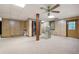 Spacious basement features a drop ceiling and paneled walls at 2101 Breconridge Sw Dr, Marietta, GA 30064
