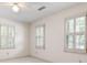 Bedroom featuring neutral walls and shuttered windows at 2101 Breconridge Sw Dr, Marietta, GA 30064