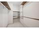 Walk in closet with built-in shelving and a window for natural light at 2101 Breconridge Sw Dr, Marietta, GA 30064