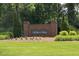 Community entrance sign for Walker's Ridge surrounded by lush landscaping and green grass at 2101 Breconridge Sw Dr, Marietta, GA 30064