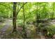 A small creek runs through the property at 2101 Breconridge Sw Dr, Marietta, GA 30064
