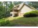 Exterior of home with siding, backyard, and screened in porch at 2101 Breconridge Sw Dr, Marietta, GA 30064