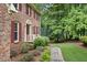 Close up of the front of the brick home, showing the walkway and landscaping at 2101 Breconridge Sw Dr, Marietta, GA 30064