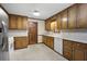 Well-maintained kitchen with laminate counters and wood cabinets at 2101 Breconridge Sw Dr, Marietta, GA 30064