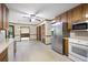 Spacious kitchen with stainless steel refrigerator, built in microwave and plenty of storage at 2101 Breconridge Sw Dr, Marietta, GA 30064