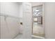 Laundry room with storage shelves adjacent to the kitchen at 2101 Breconridge Sw Dr, Marietta, GA 30064