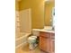Bathroom with tub, shower, and wood vanity cabinet at 2653 Parkway Trl, Lithonia, GA 30058