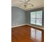 Bedroom with hardwood flooring, neutral paint, and vaulted ceiling at 2653 Parkway Trl, Lithonia, GA 30058