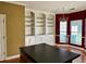 Kitchen featuring wood floors, chandelier, island, and built in shelving at 2653 Parkway Trl, Lithonia, GA 30058