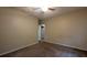 Bedroom featuring carpeted floors and closet at 345 Deerwood Dr, Suwanee, GA 30024